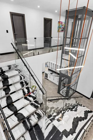 a view of swimming pool with outdoor seating