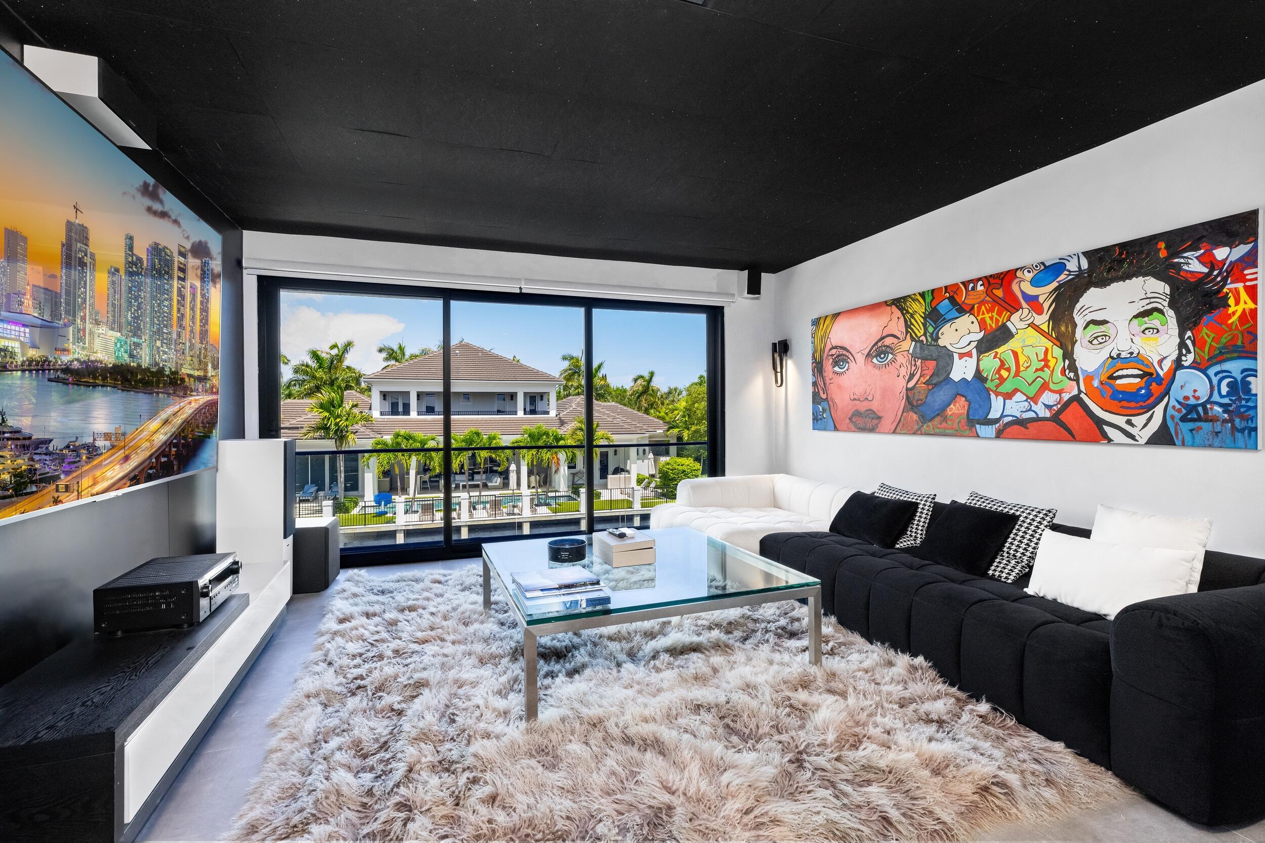 839 Northeast Bay Isle Drive Boca Raton, FL 33487 - Photo 51 of 103 a living room with furniture lamp and large window