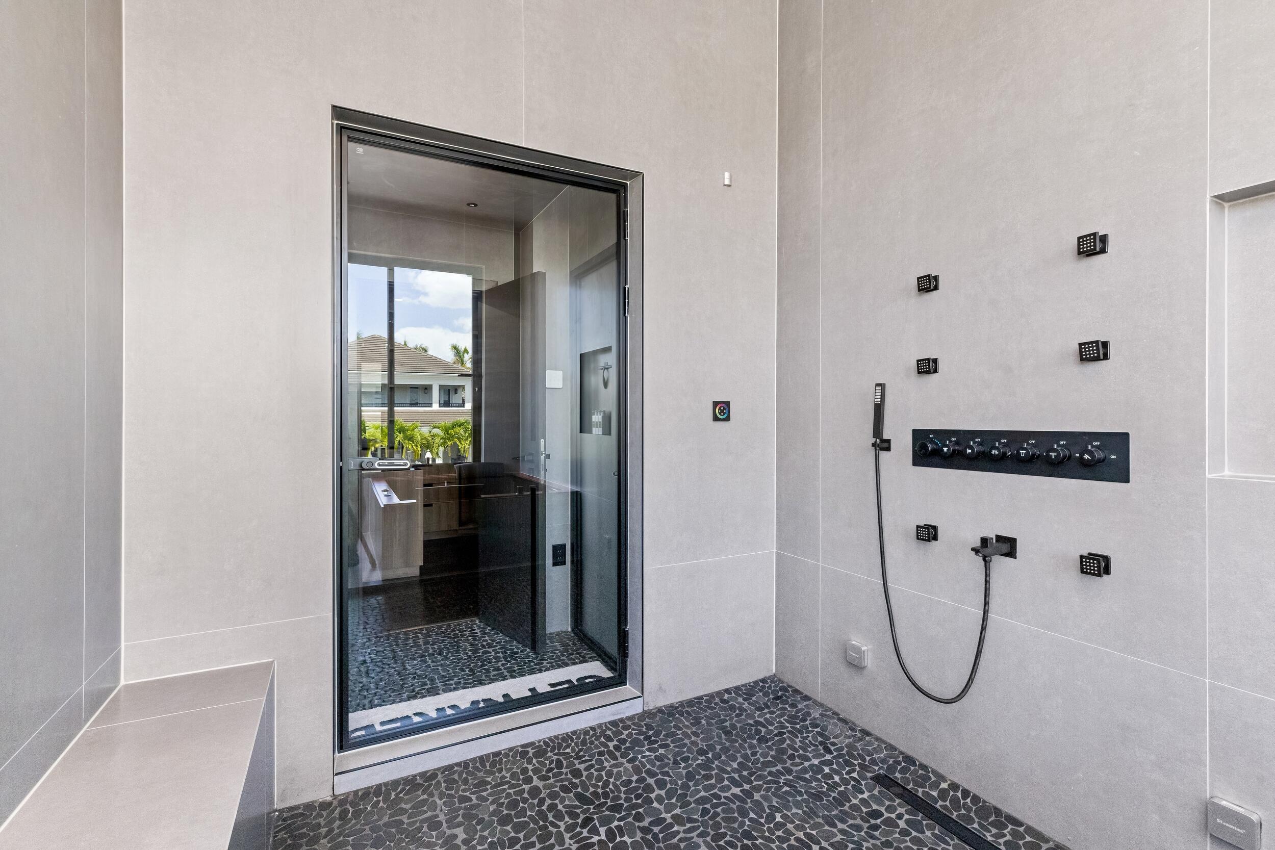 839 Northeast Bay Isle Drive Boca Raton, FL 33487 - Photo 61 of 103 a bathroom with a shower