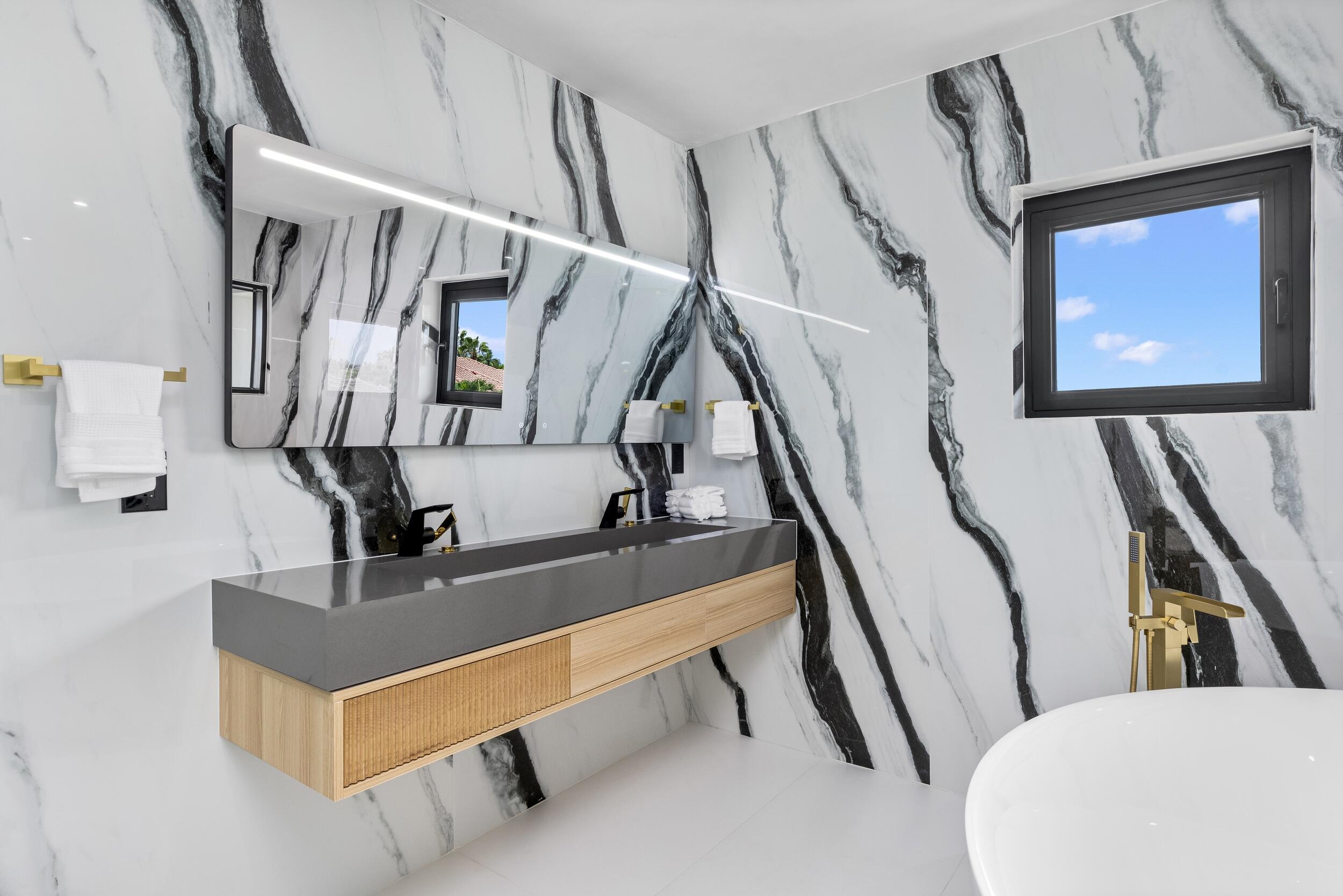 839 Northeast Bay Isle Drive Boca Raton, FL 33487 - Photo 67 of 103 Guest Bath 1