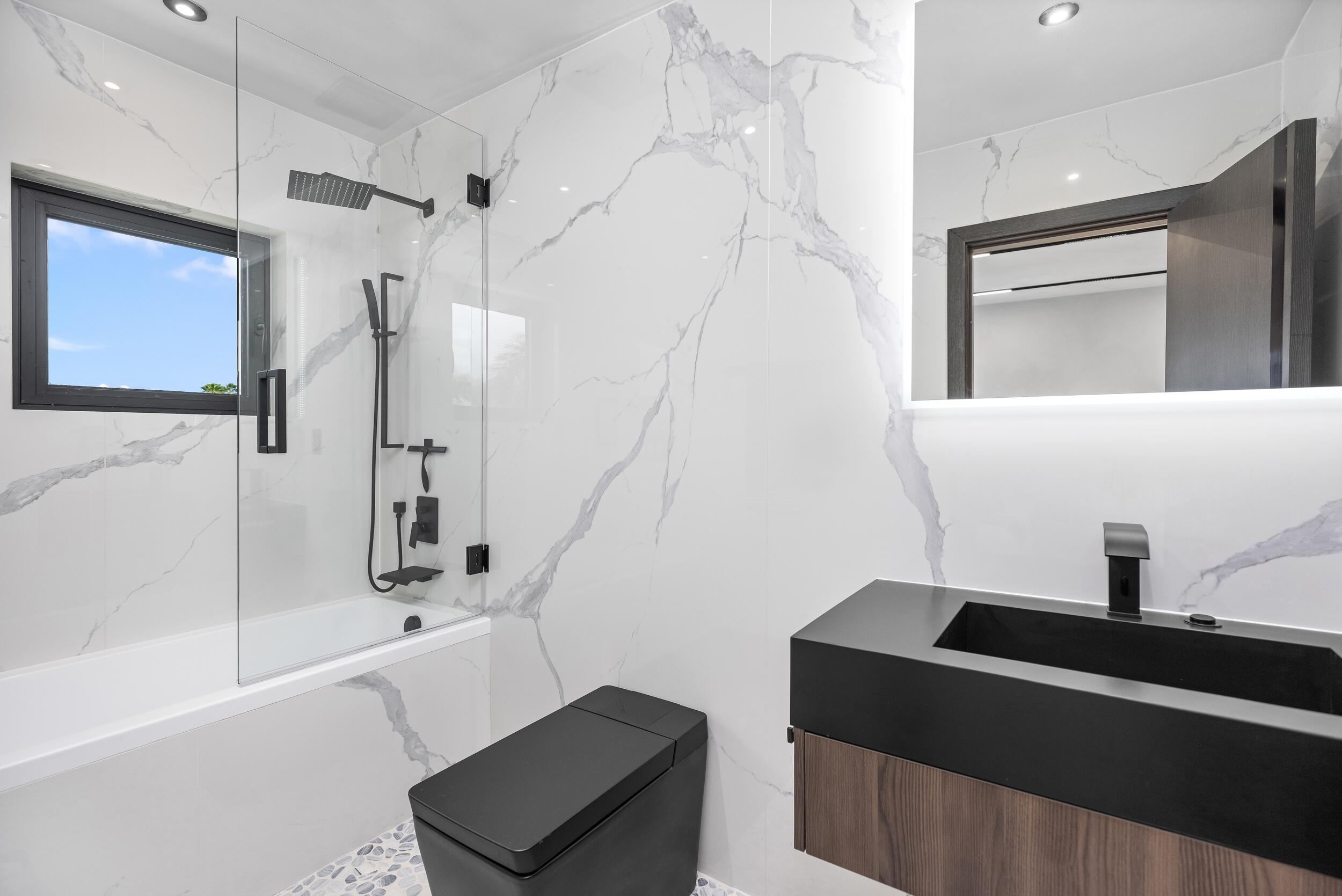 839 Northeast Bay Isle Drive Boca Raton, FL 33487 - Photo 76 of 103 Guest Bath 6