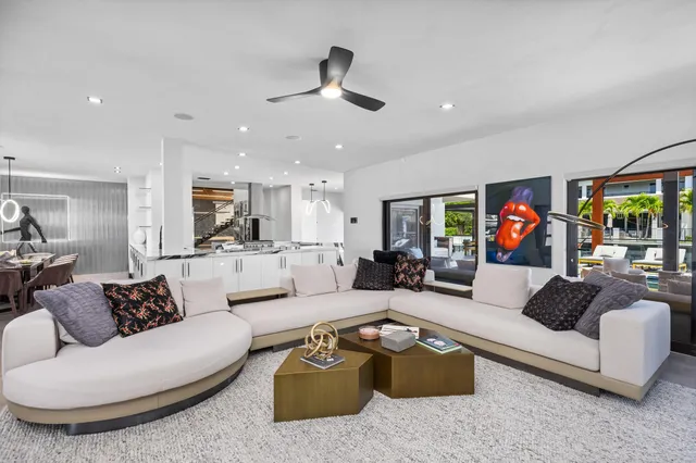 a view of a lake with lawn chairs