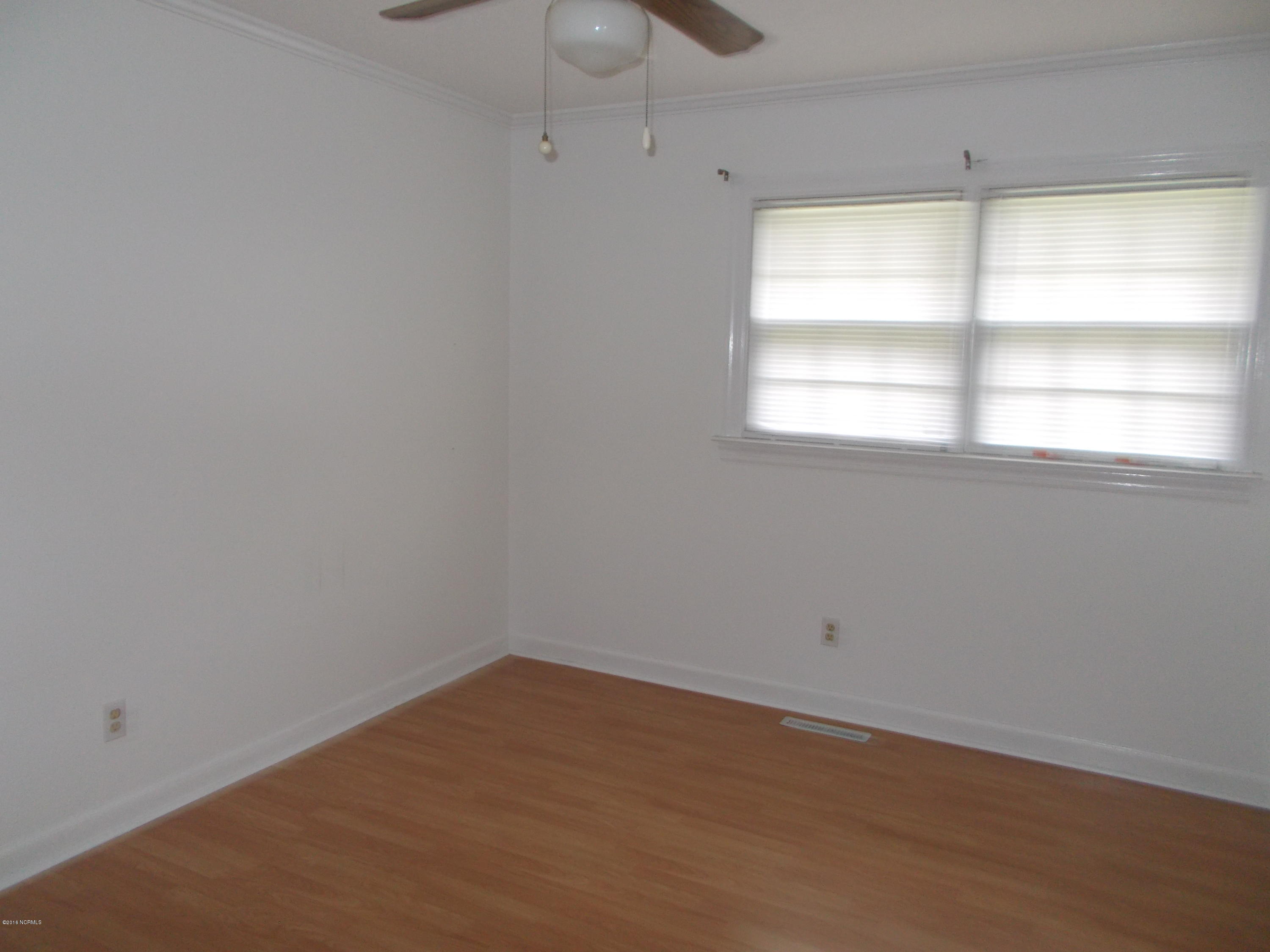 1793 Maple Leaf Road Kinston, NC 28504 - Photo 9 of 17 Bedroom with laminate flooring and ceiling fan