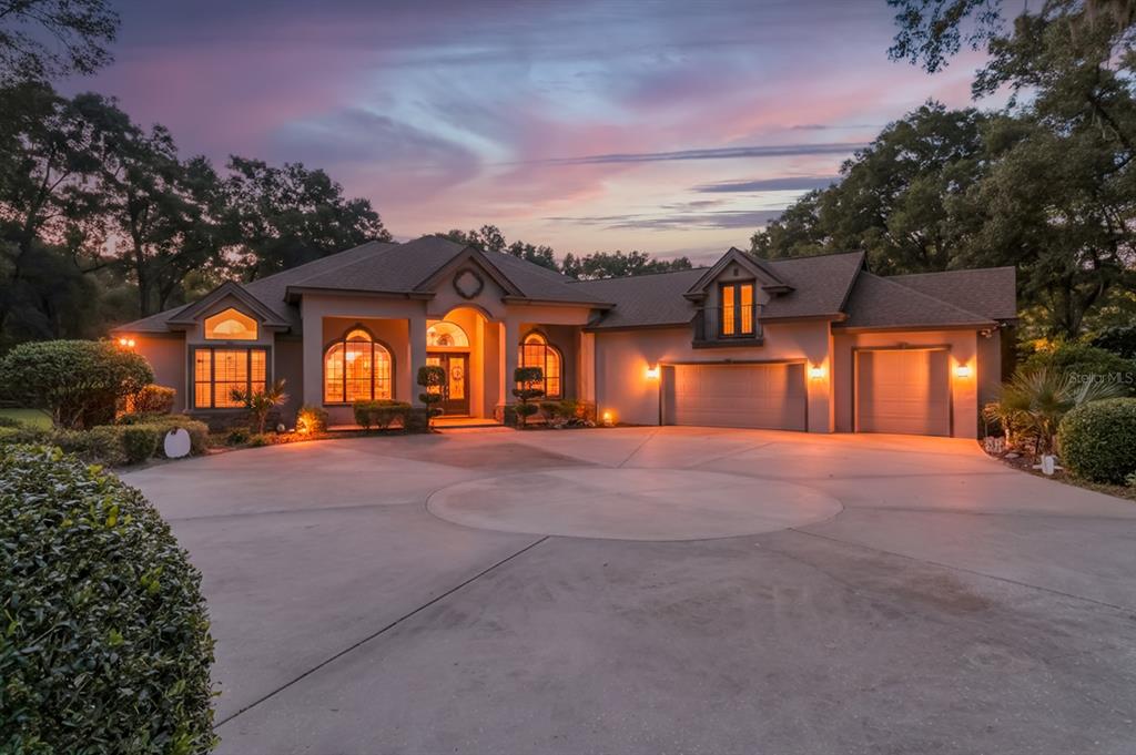 1640 Southeast 91st Place Ocala, FL 34480 - Photo 1 of 66 a view of a house with a yard