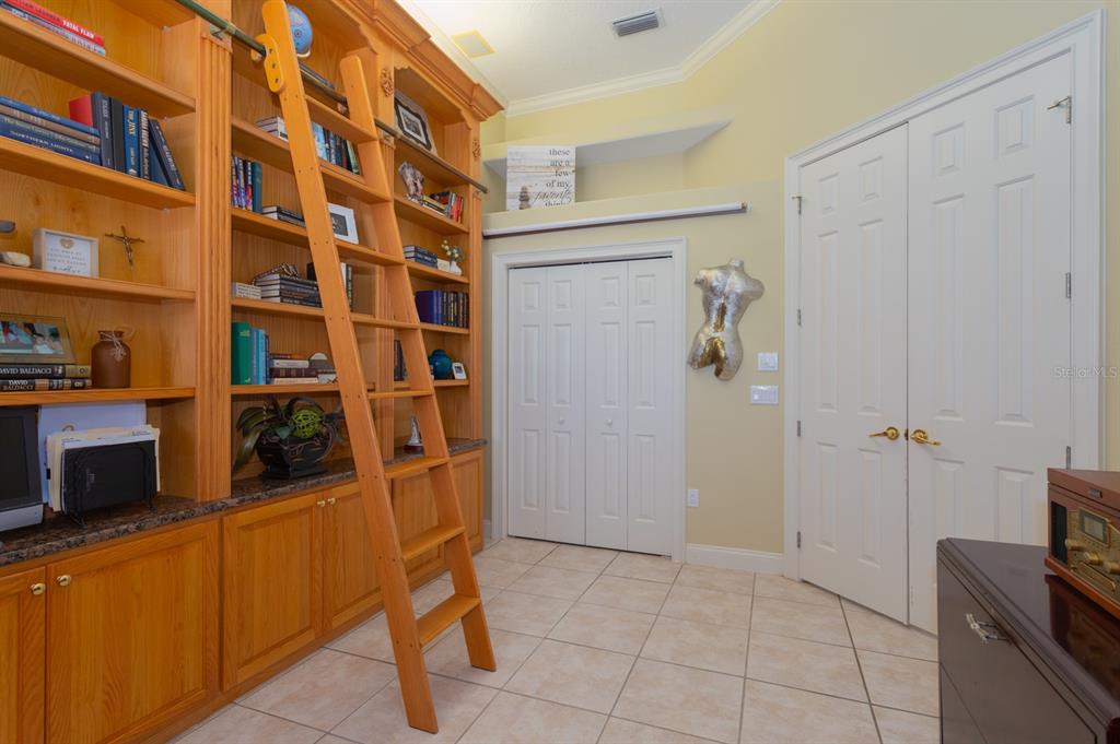 1640 Southeast 91st Place Ocala, FL 34480 - Photo 19 of 66 a view of a storage & utility room with cabinets