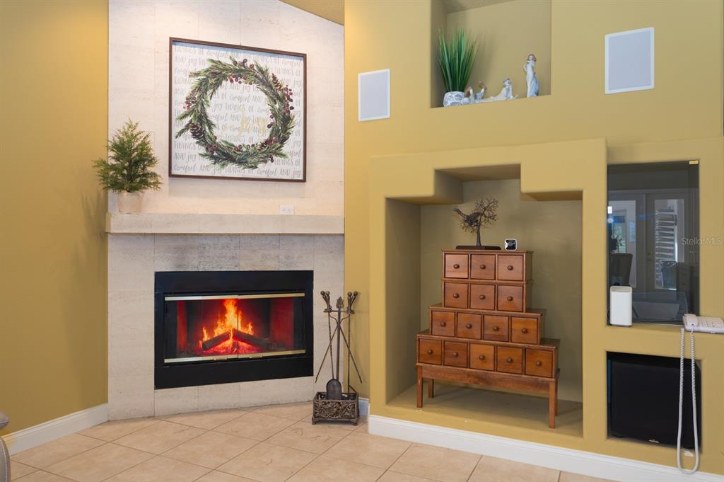 1640 Southeast 91st Place Ocala, FL 34480 - Photo 33 of 66 a living room with a fireplace
