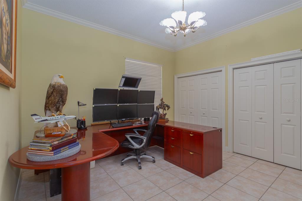 1640 Southeast 91st Place Ocala, FL 34480 - Photo 37 of 66 a view of a workspace with furniture