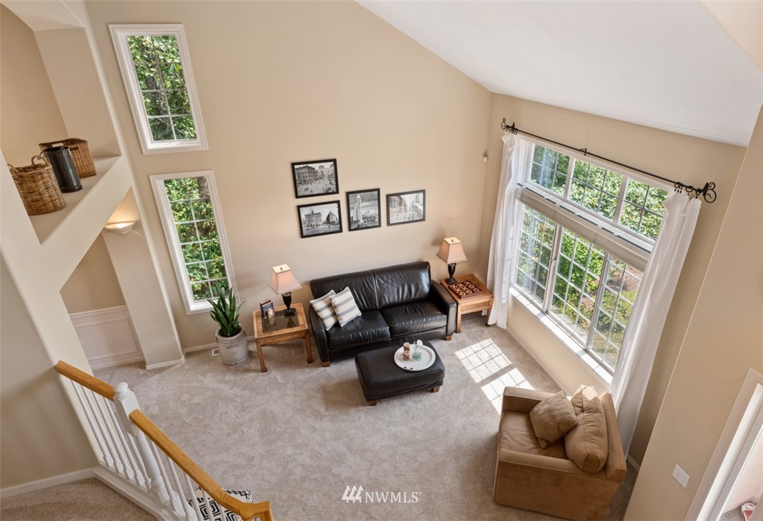 425 172nd Place Southeast Bothell, WA 98012 - Photo 22 of 32 a living room with furniture and a large window