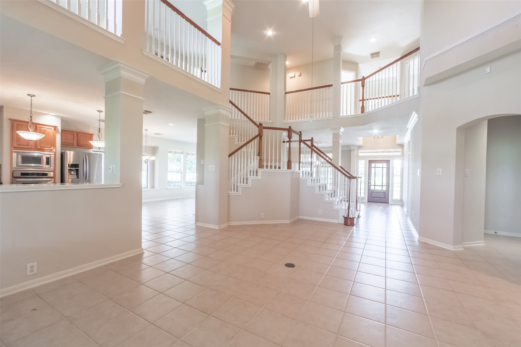 4903 Bowser Road Fulshear, TX 77441 - Photo 13 of 50 From the Family room the home is open to Kitchen and upstairs Loft