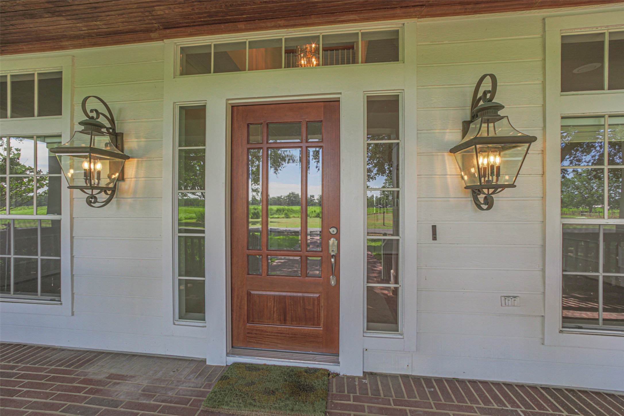 4903 Bowser Road Fulshear, TX 77441 - Photo 4 of 50 Impressive entrance with brick pavers and beadboard ceiling