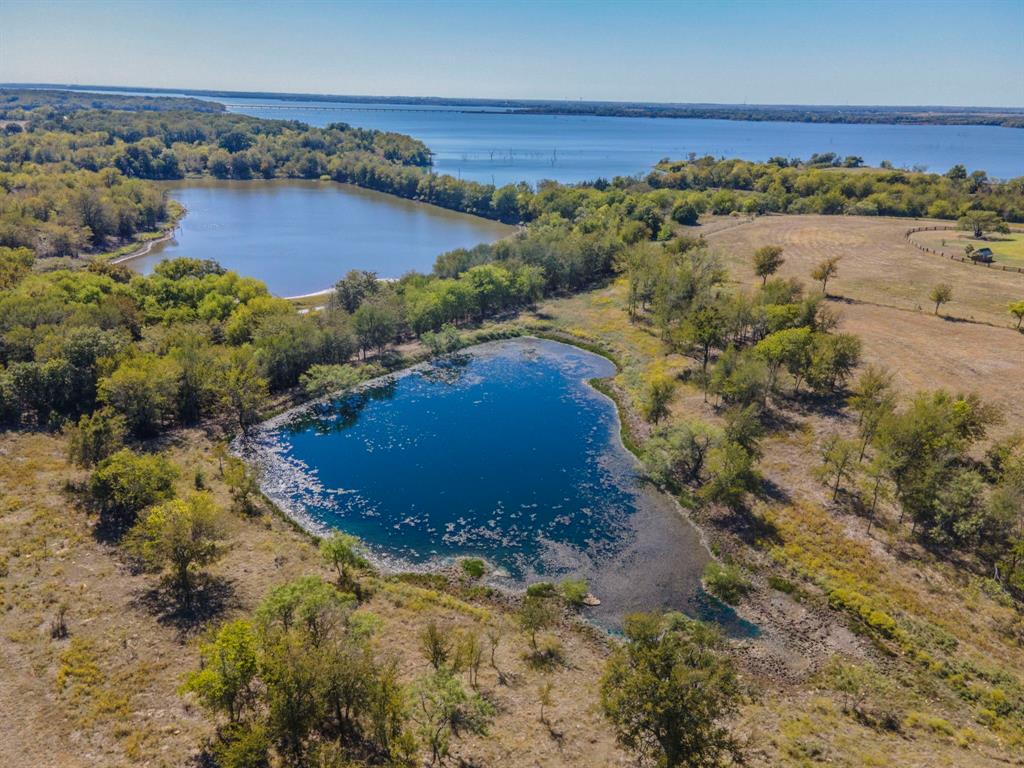 0 Bevers Lane Valley View, TX 76272 - Photo 8 of 10 a view of lake with green space