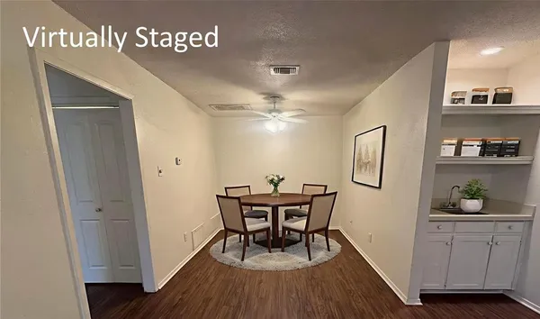 a workspace with furniture and wooden floor