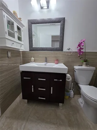 a bathroom with a sink and a toilet