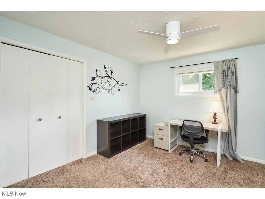 2643 Massillon Road Akron, OH 44312 - Photo 12 of 33 Carpeted home office with ceiling fan