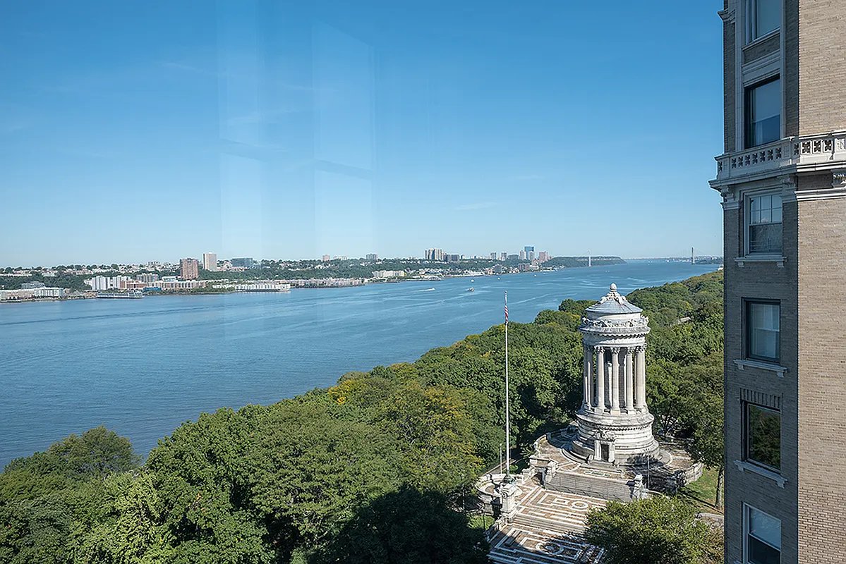 155 Riverside Drive, Unit 10C Manhattan, NY 10024 - Photo 6 of 11 a view of a lake with houses in front of it