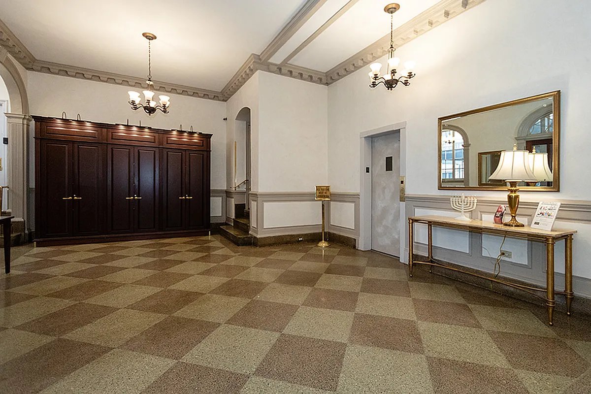 155 Riverside Drive, Unit 10C Manhattan, NY 10024 - Photo 9 of 11 a bathroom with a sink vanity and a mirror