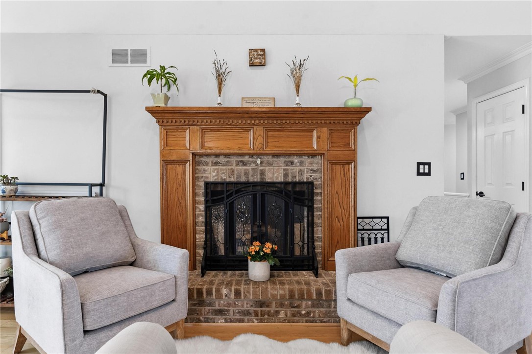 8781 Rupp Farm Drive West Chester, OH 45069 - Photo 10 of 48 This living space features a cozy hearth, perfect for intimate gatherings.