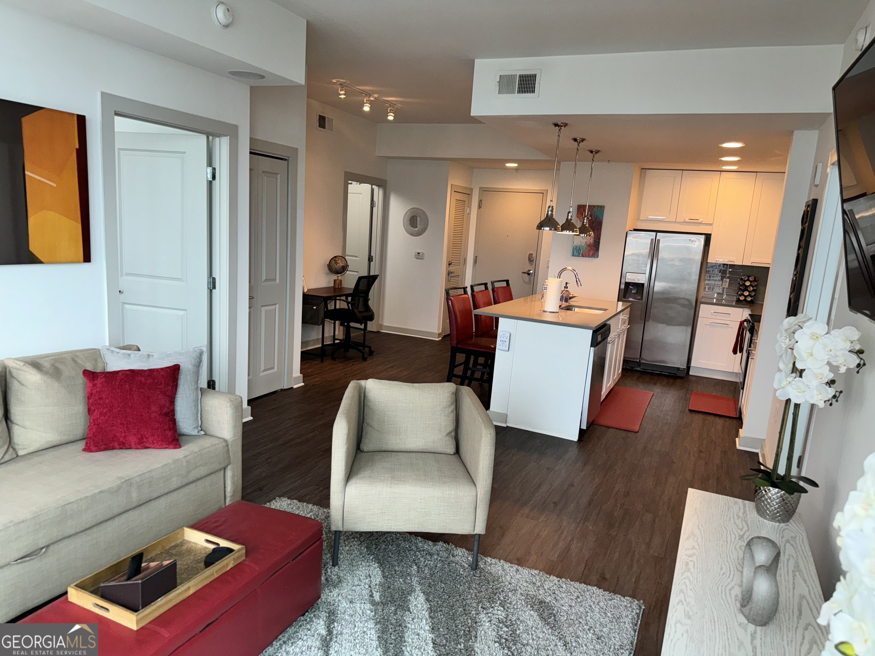 3382 Peachtree Road, Unit S12 Atlanta, GA 30326 - Photo 16 of 47 a living room with furniture and wooden floor