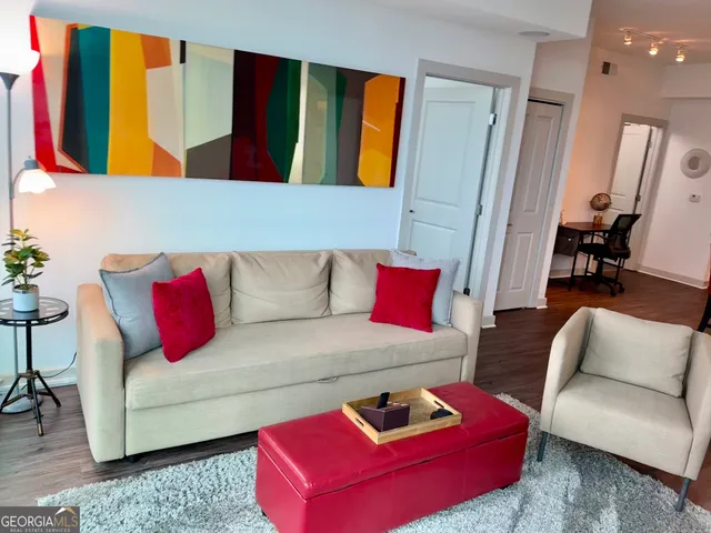 a living room with furniture and a couch