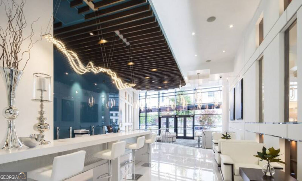 3382 Peachtree Road, Unit S12 Atlanta, GA 30326 - Photo 32 of 47 a bathroom with a large window and double vanity