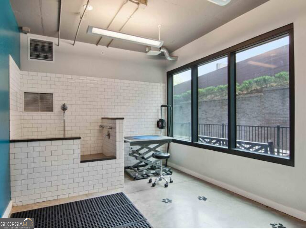 3382 Peachtree Road, Unit S12 Atlanta, GA 30326 - Photo 47 of 47 a bathroom with a bathtub and a shower