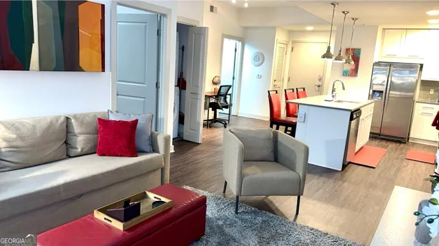 a living room with furniture and a table