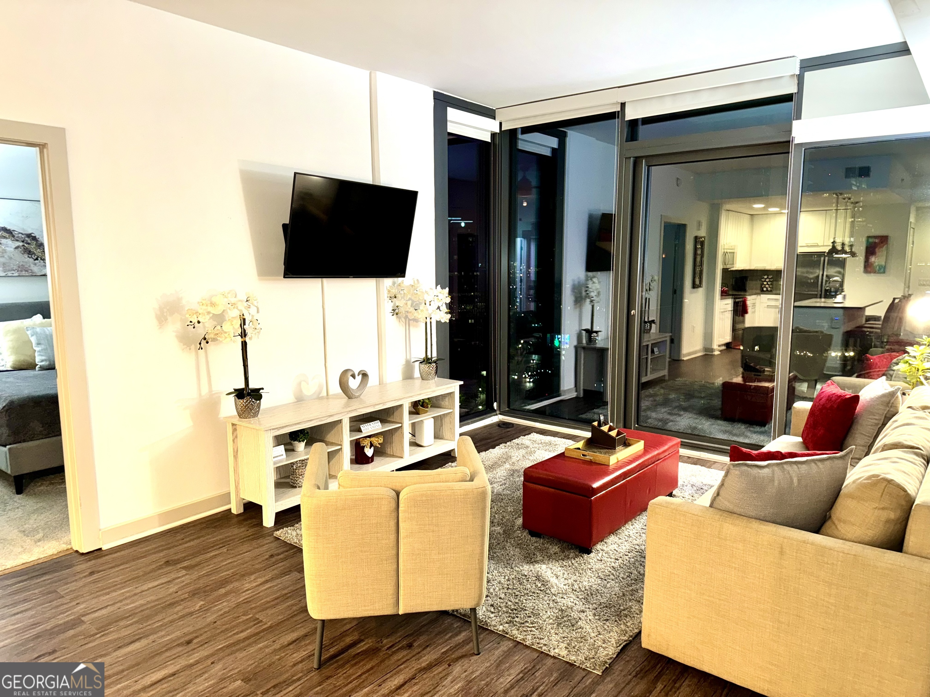 3382 Peachtree Road, Unit S12 Atlanta, GA 30326 - Photo 9 of 47 a living room with furniture and a flat screen tv