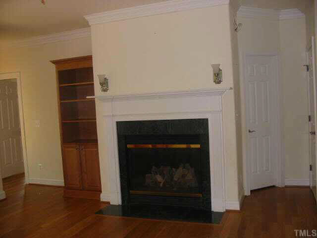 7332 Thompson Mill Road Wake Forest, NC 27587 - Photo 4 of 10 FIREPLACE IN FAMILY ROOM