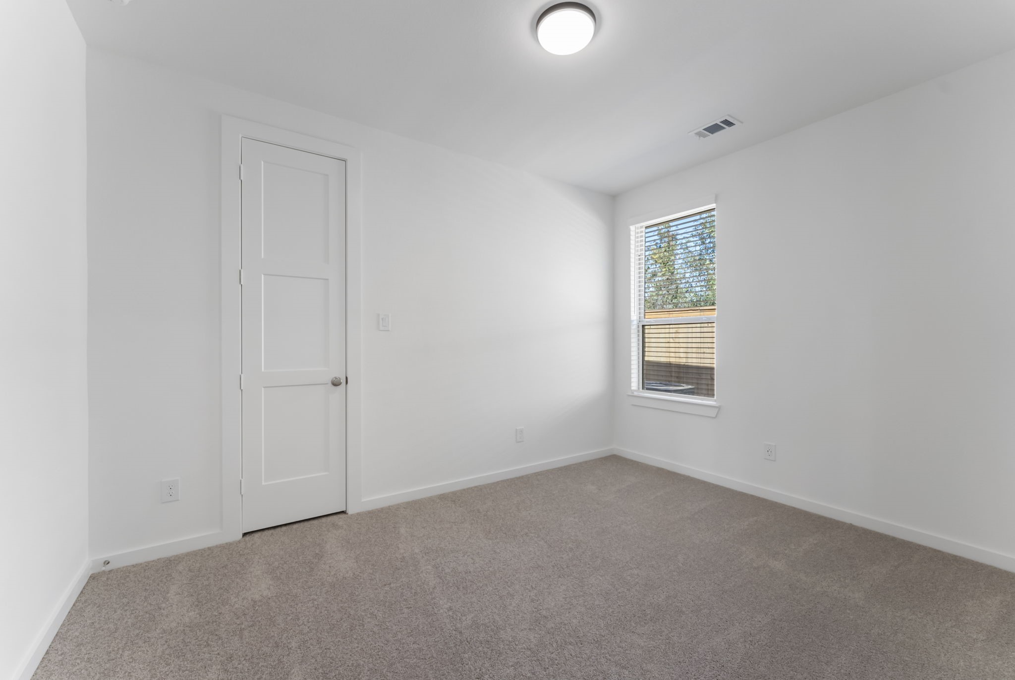 26383 Golden Pass Loop Montgomery, TX 77316 - Photo 23 of 43 an empty room with windows