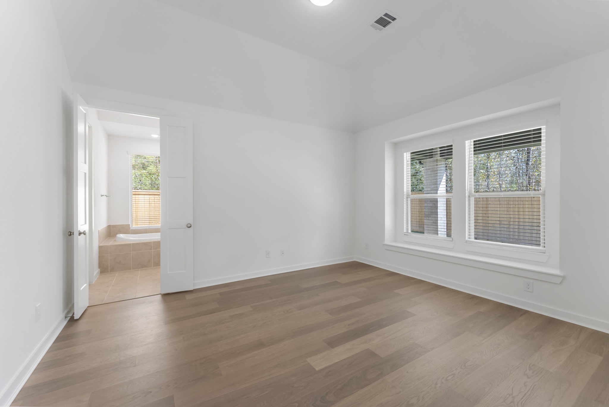 26383 Golden Pass Loop Montgomery, TX 77316 - Photo 26 of 43 a view of an empty room with a window