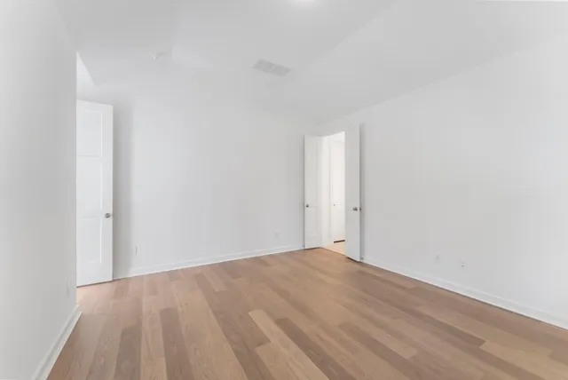 a bathroom with a tub a sink and a shower