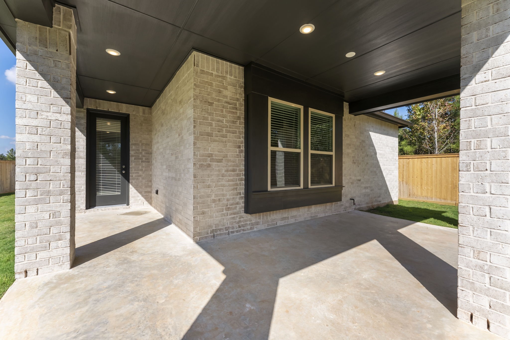 26383 Golden Pass Loop Montgomery, TX 77316 - Photo 36 of 43 a view of house with large windows and entryway