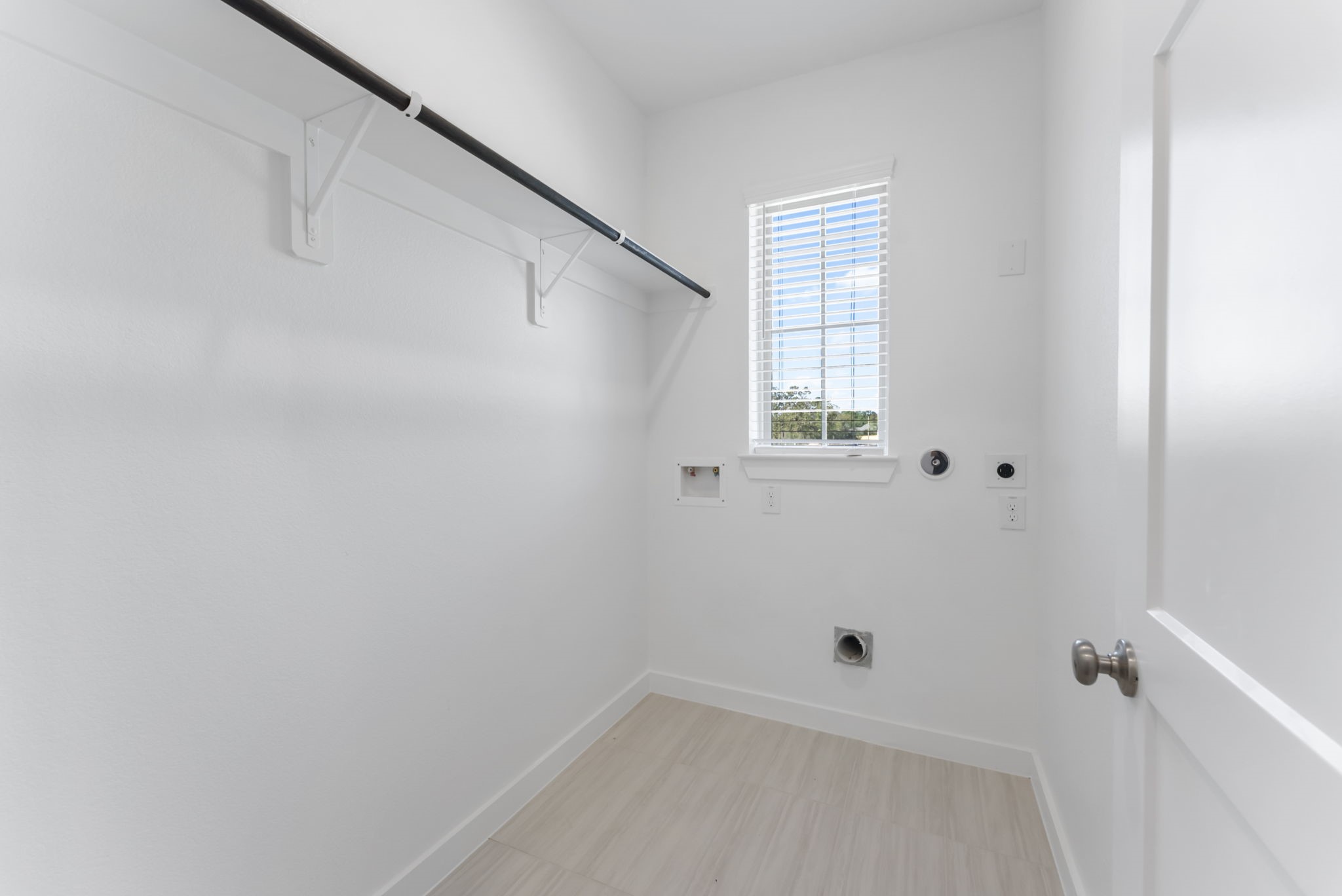 26383 Golden Pass Loop Montgomery, TX 77316 - Photo 6 of 43 a view of an empty room with a window