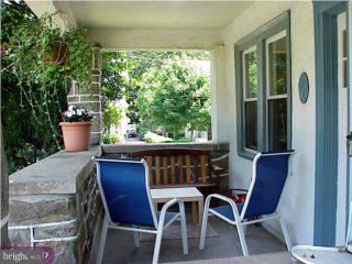 551 Kenmore Road Havertown, PA 19083 - Photo 4 of 6 a view of balcony with table and chairs