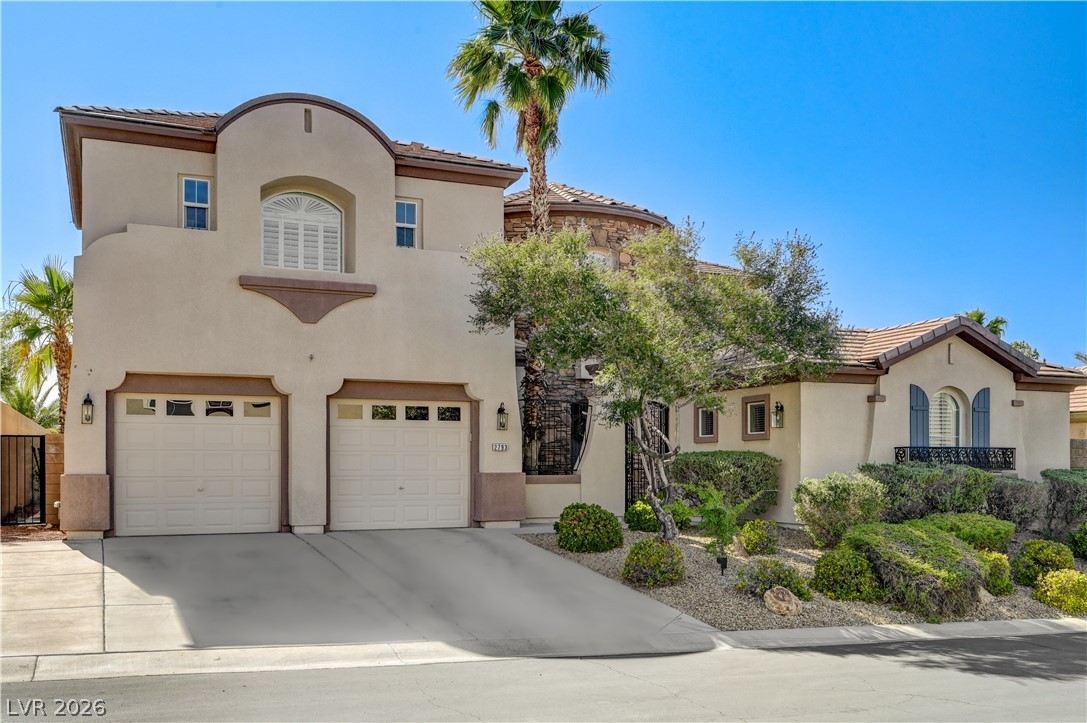2793 Rosenhearty Drive Henderson, NV 89044 - Photo 69 of 85 This desert contemporary home boasts a two-car garage and manicured landscaping.