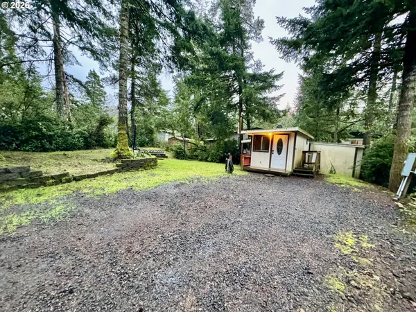 a house view with a backyard space