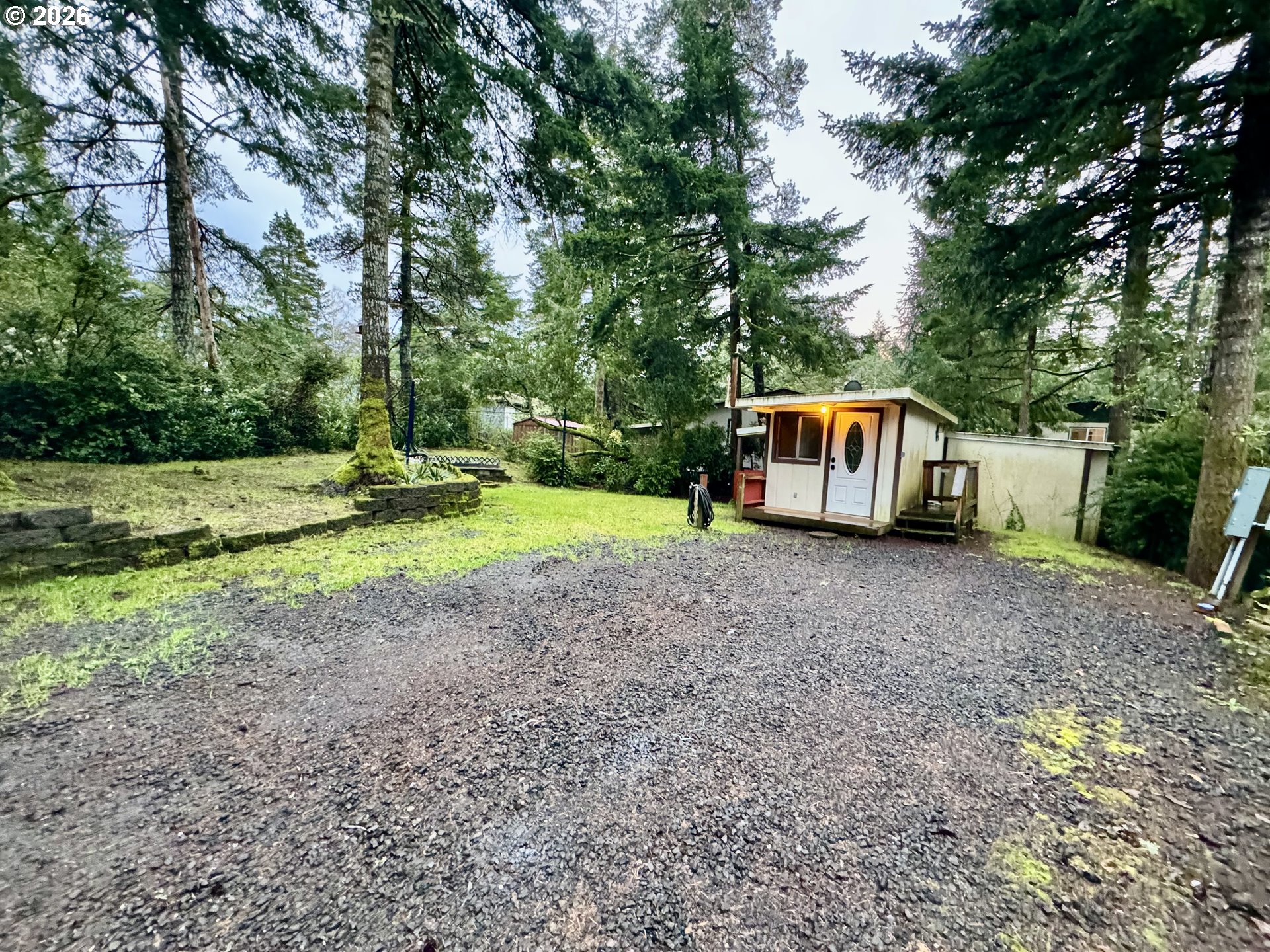 125 Sailor Lane Florence, OR 97439 - Photo 3 of 7 a house view with a backyard space