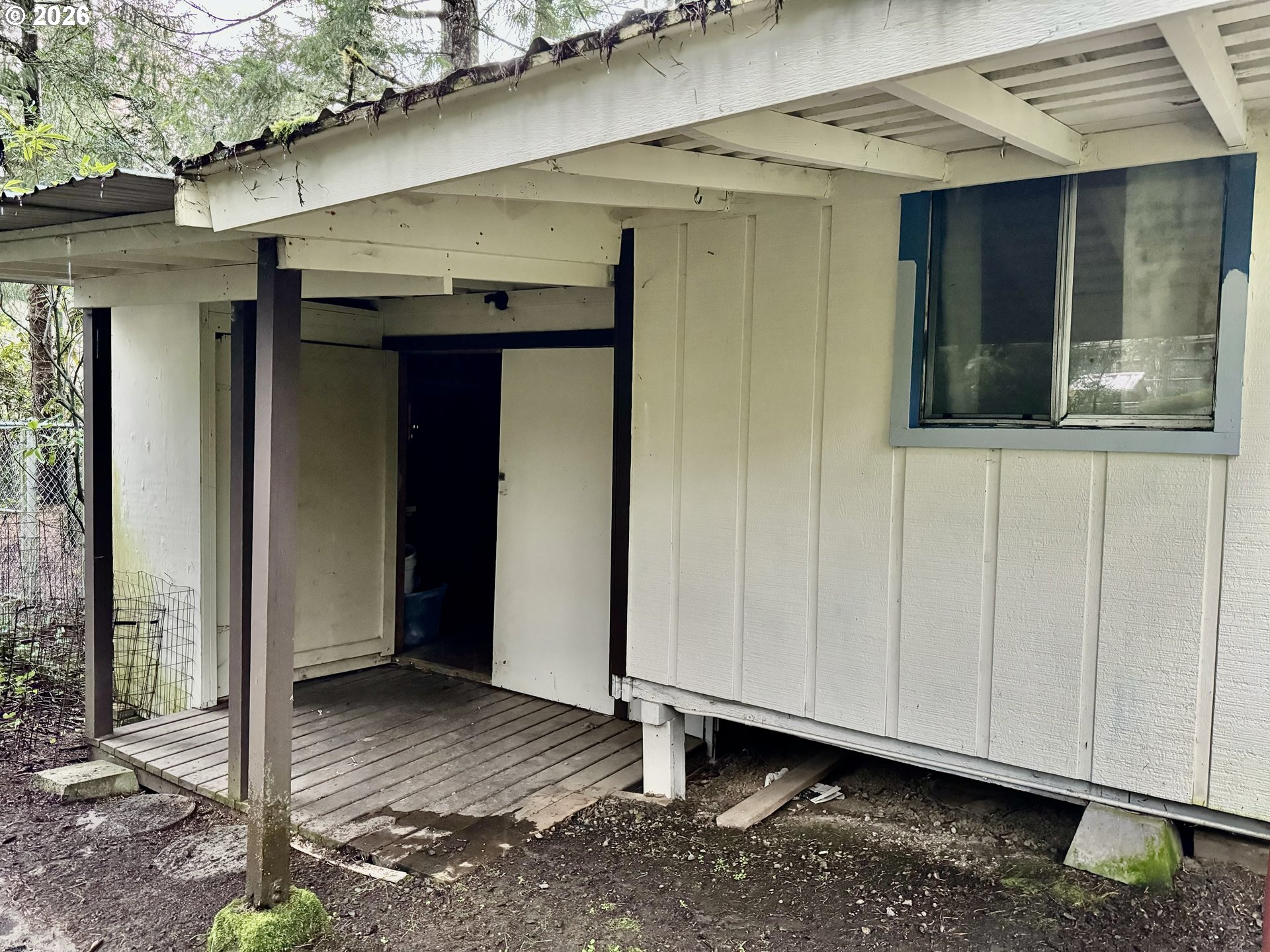 125 Sailor Lane Florence, OR 97439 - Photo 7 of 7 a view of a house with a door
