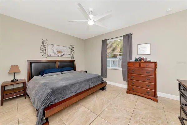 a bedroom with a bed and furniture