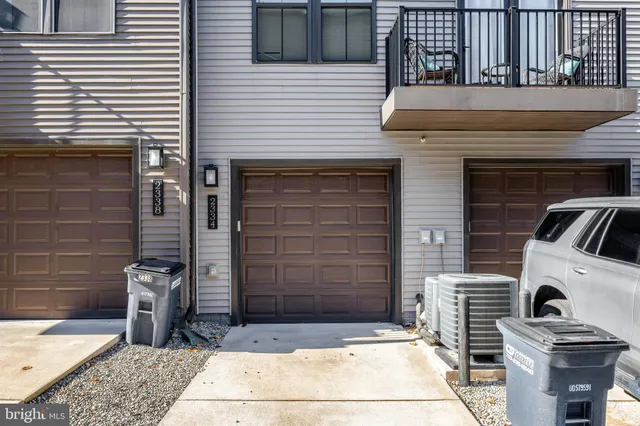 a view of a building with a yard