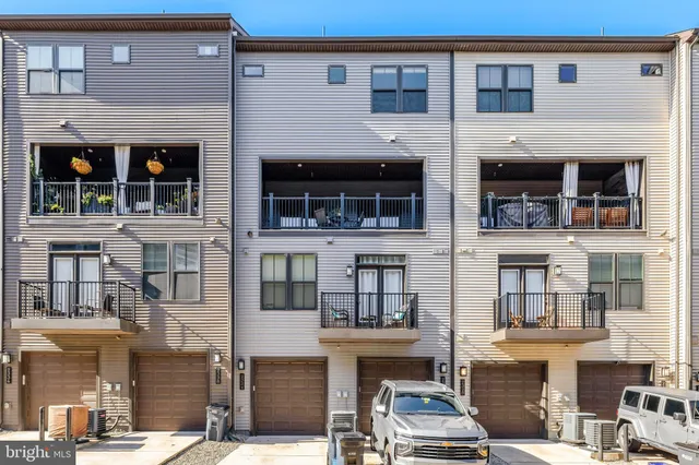 a view of a lake with a house in the background