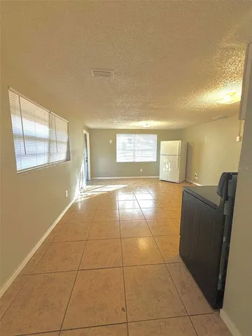 a bathroom with a toilet sink and shower
