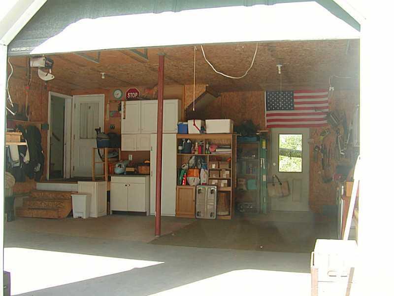 228 N Road Readfield, ME 04355 - Photo 5 of 21 Garage. WITH WORK SHOP AREA AND STORAGE