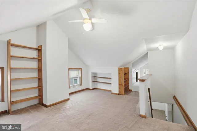 a view of a room with staircase