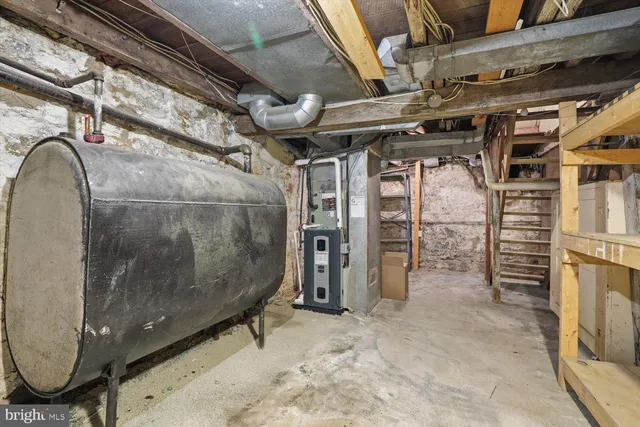 a view of a house with a snow in the yard