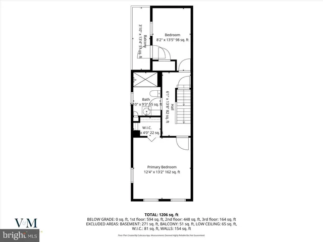 a picture of a bench in front of a wall