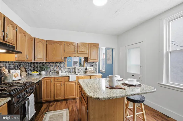 a bathroom with a sink double vanity and a mirror