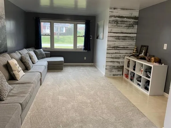 a living room with furniture and couch