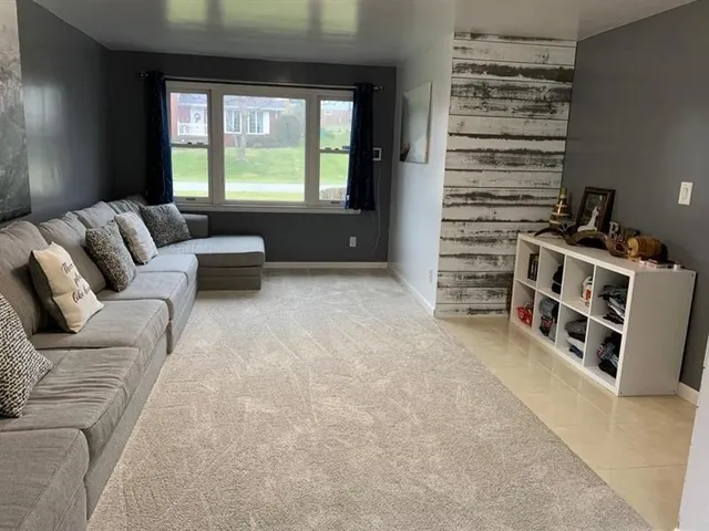 a living room with furniture and couch