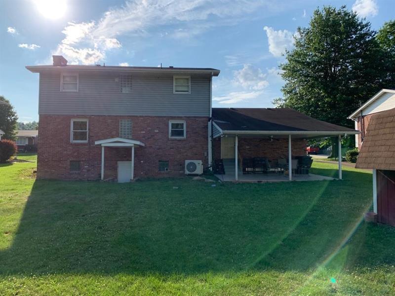 206 Bonnie Street Rostraver Township, PA 15012 - Photo 26 of 26 a view of house with a yard